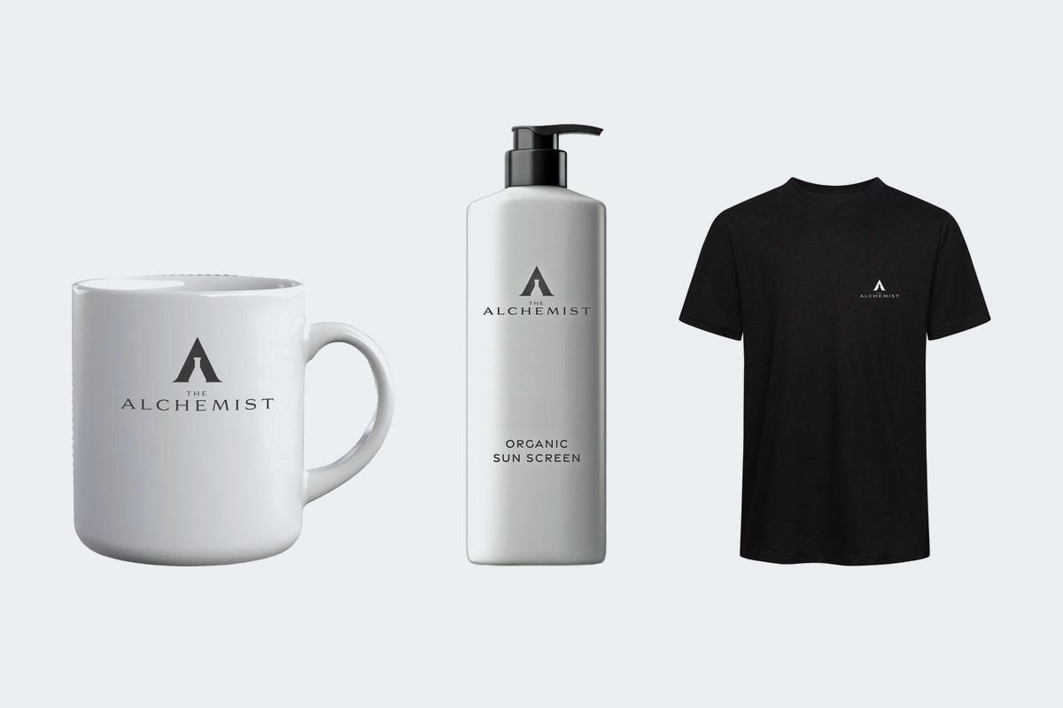 Branded Alchemist mug, sun screen bottle and black T-shirt
